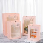 Пакет с ПВХ окном розовый 15*20*10см